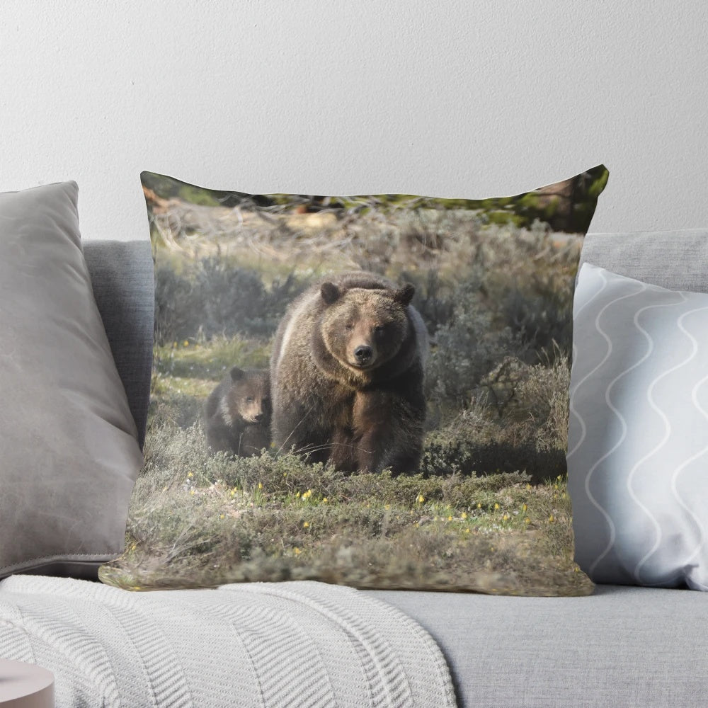 Plush, high-quality pillow featuring a stunning image of a grizzly bear cub in a natural setting.
