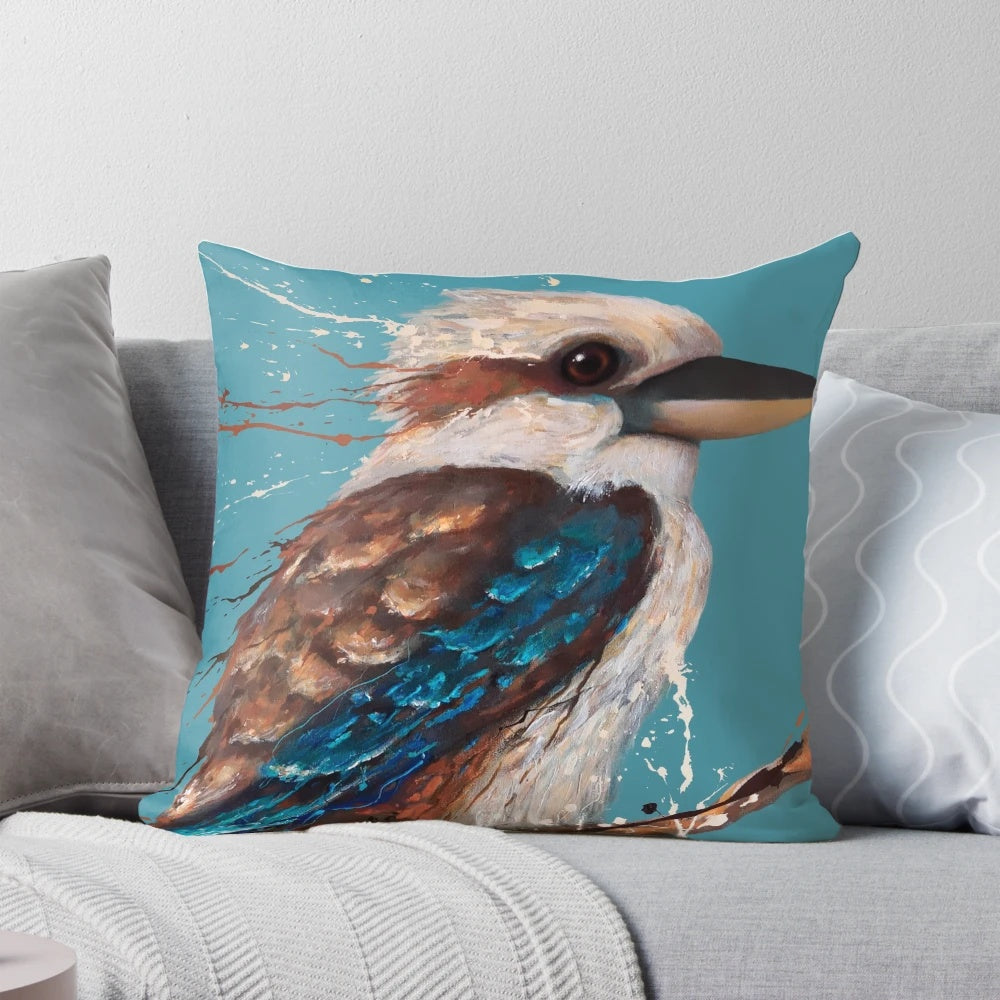 A vibrant and expressive painting of an Australian kookaburra bird on a decorative pillow