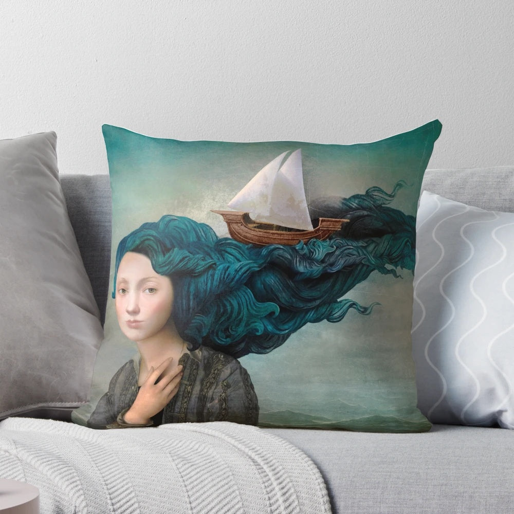 Decorative throw pillow featuring a fantasy image of a woman's hair blending into ocean waves and a ship
