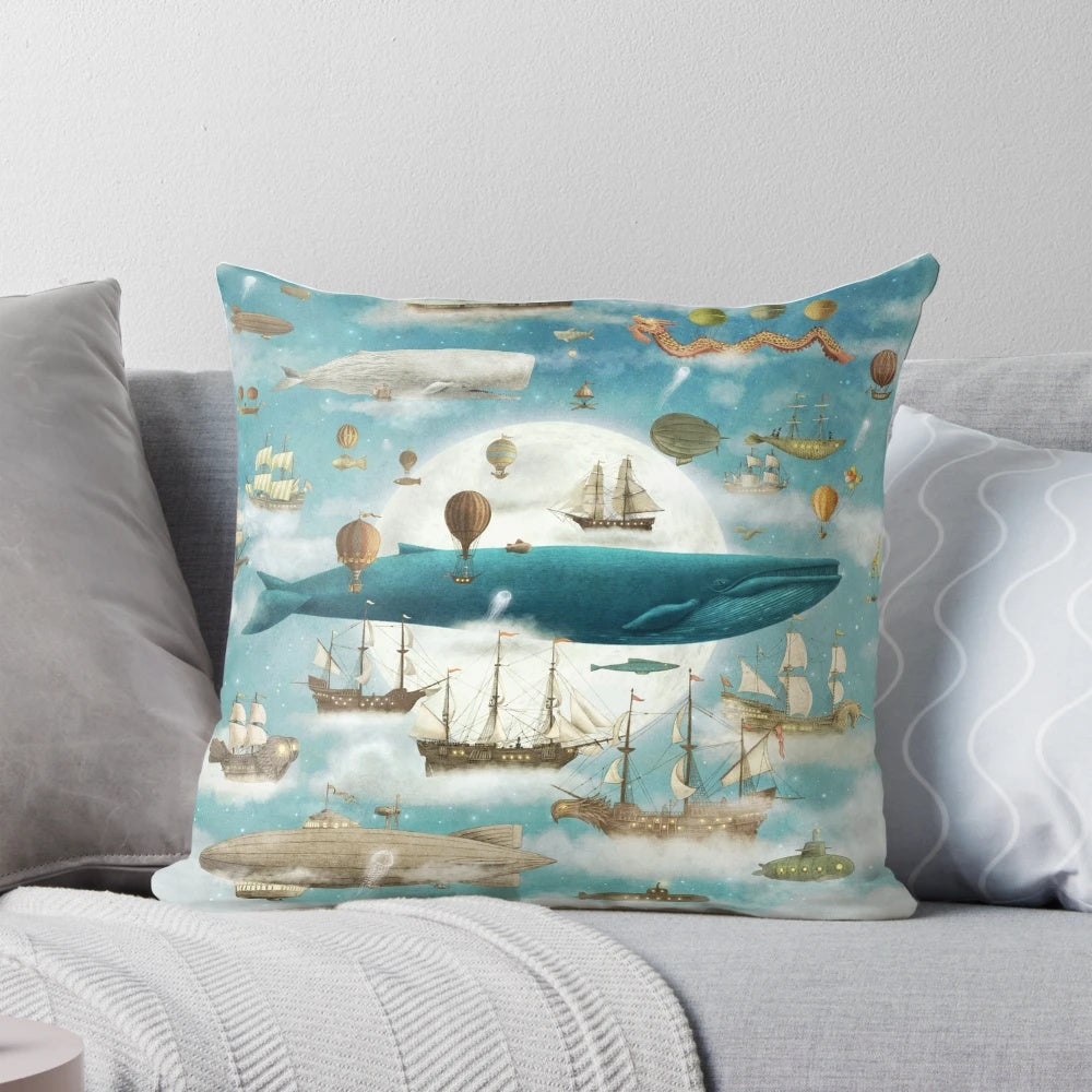 An ocean-inspired book art pillow featuring a whale and other nautical elements against a night sky.