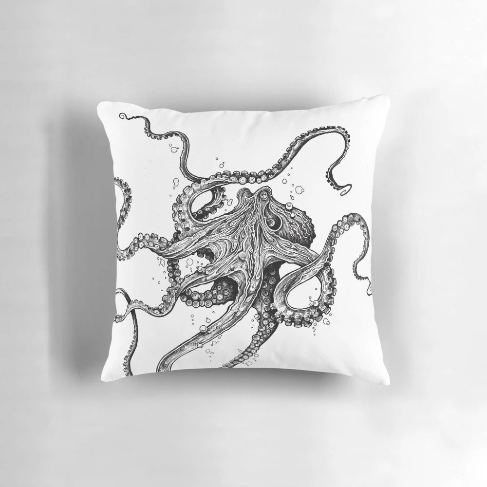 A beautiful black and white octopus pillow, featuring intricate tentacles and a striking design inspired by the ocean.