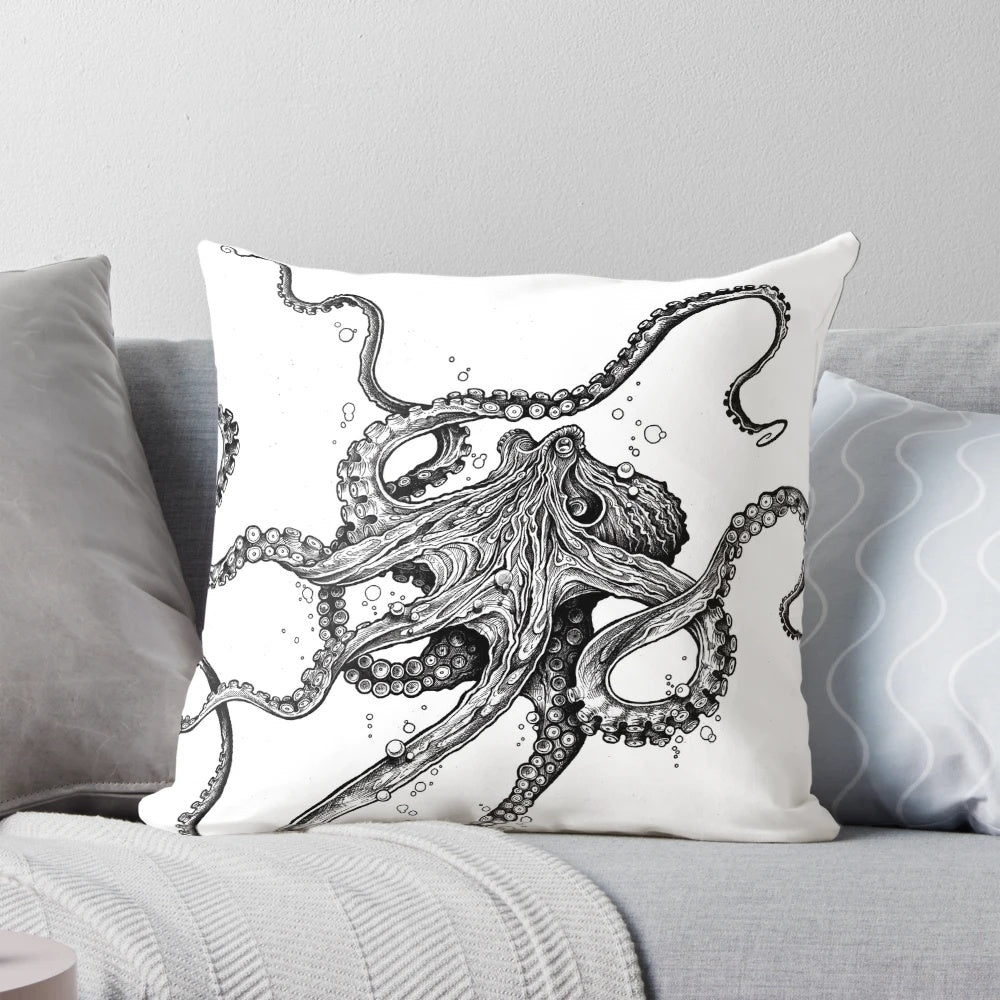 A beautiful black and white octopus pillow, featuring intricate tentacles and a striking design inspired by the ocean.