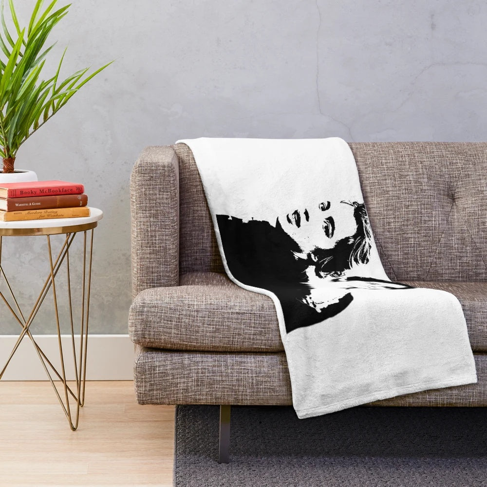 Plush blanket with a portrait cinema aesthetic design featuring female power art