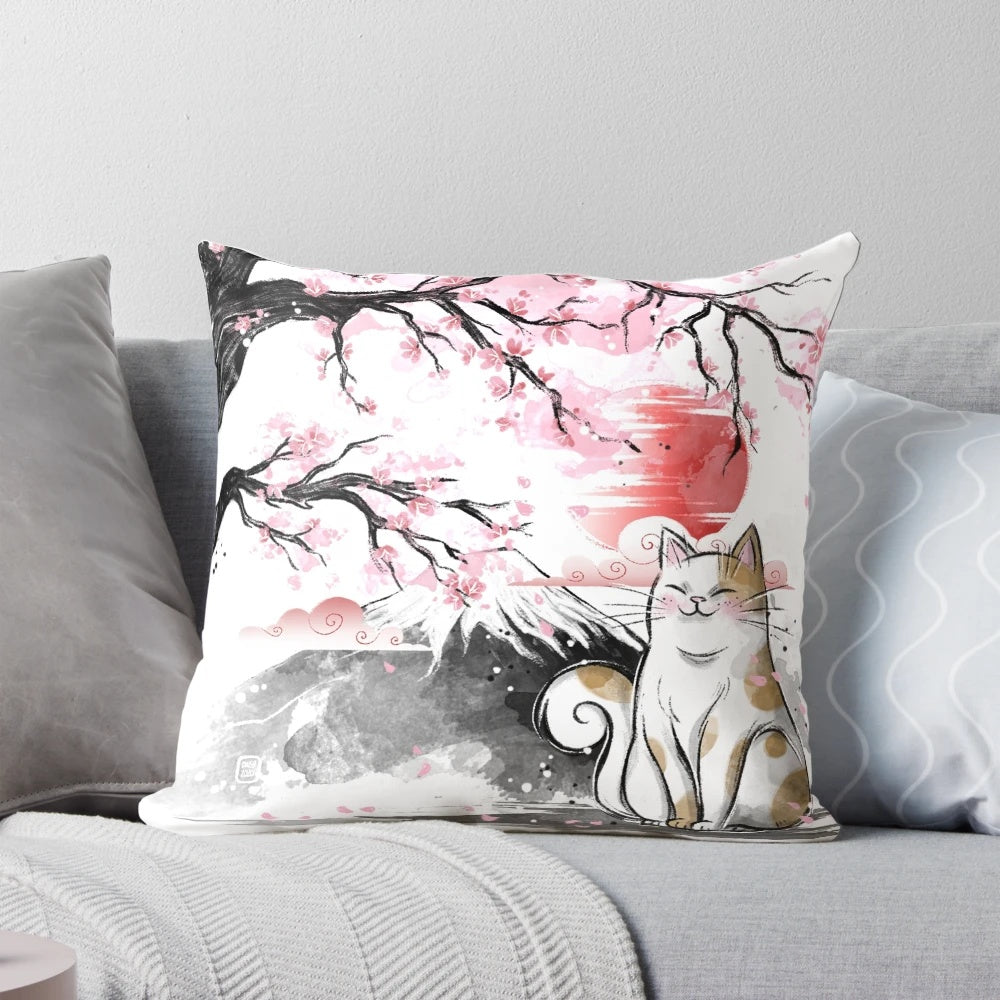 Beautifully designed sakura cat pillow with cherry blossoms and a playful feline friend