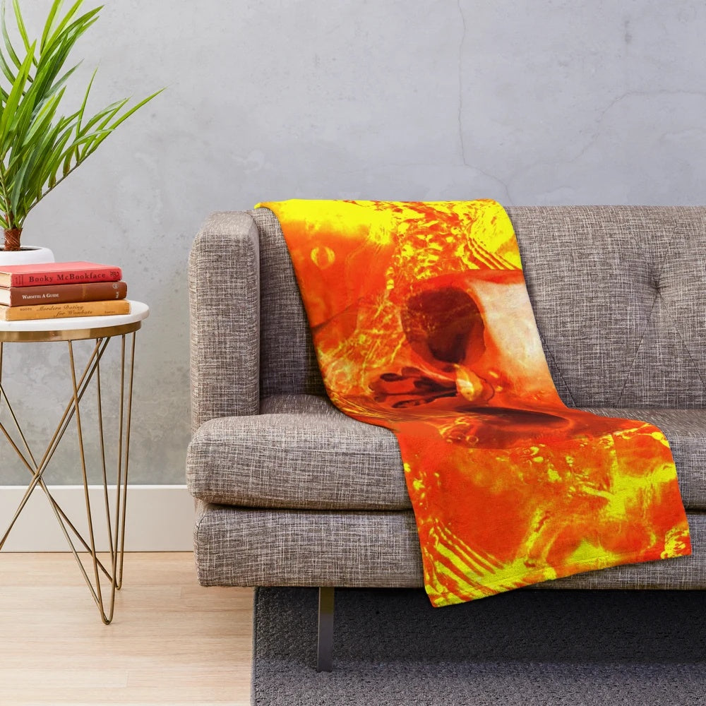 Plush skull-patterned blanket with liquid gold abstract design