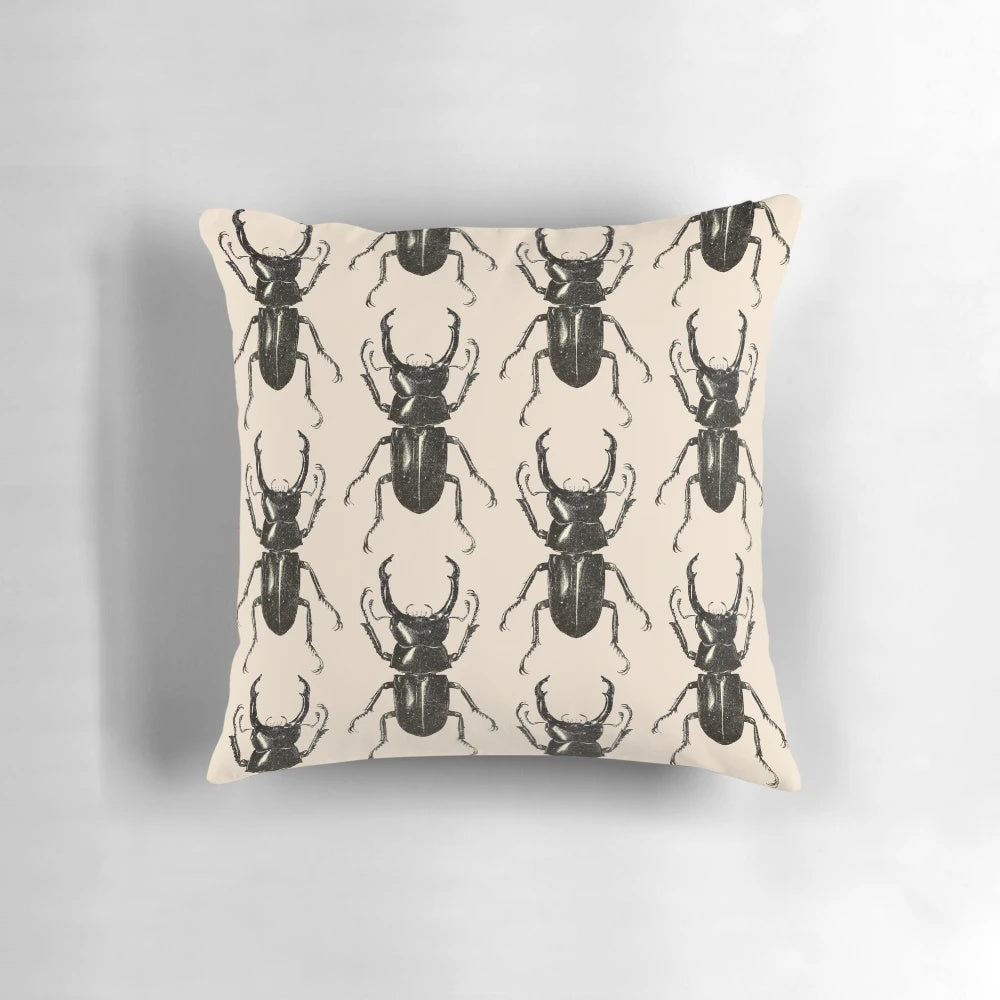 A decorative pillow featuring a detailed, intricate pattern of a stag beetle, perfect for nature and horror fans.