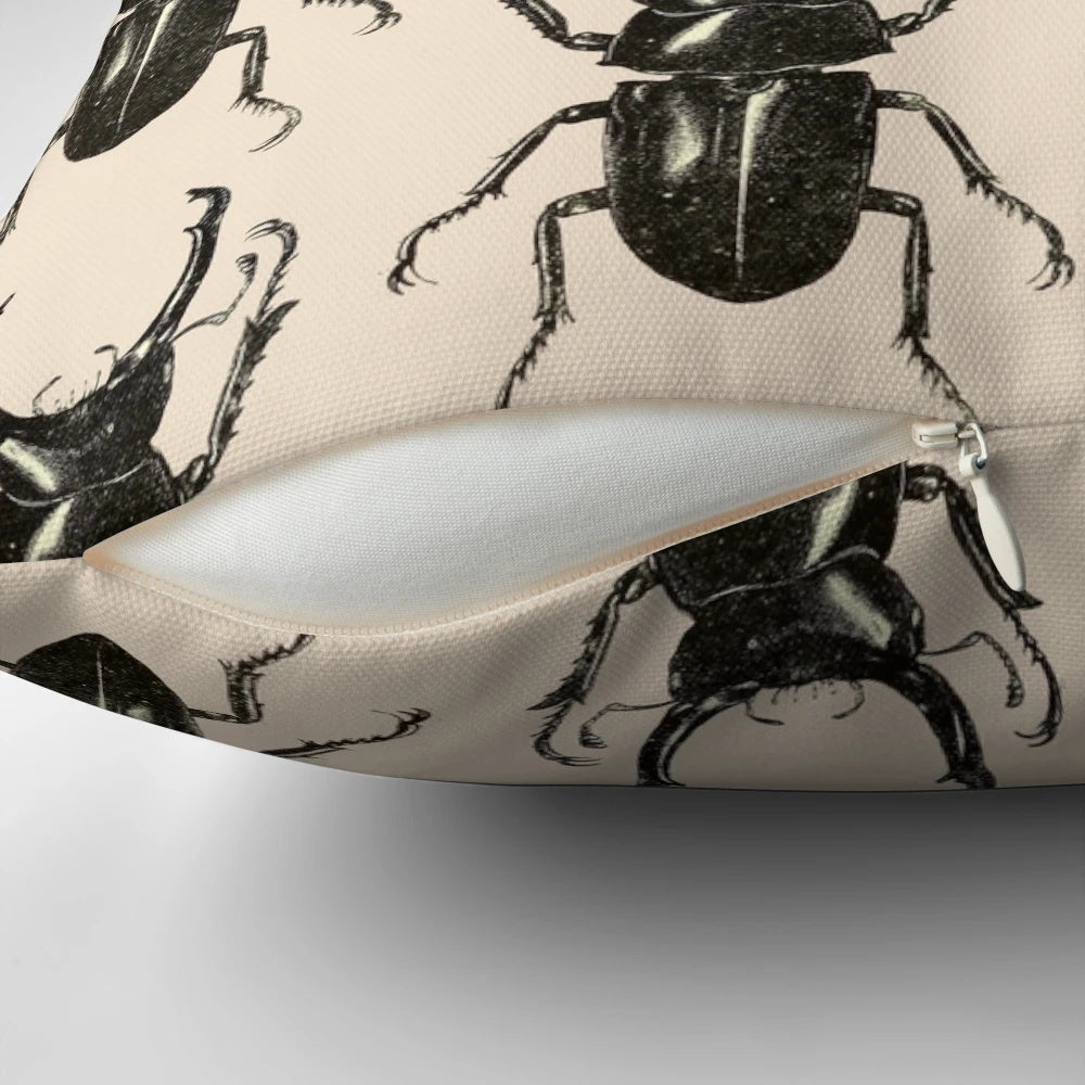 A decorative pillow featuring a detailed, intricate pattern of a stag beetle, perfect for nature and horror fans.