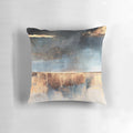 Stunning abstract art pillow with golden accents and a modern, storm-like design
