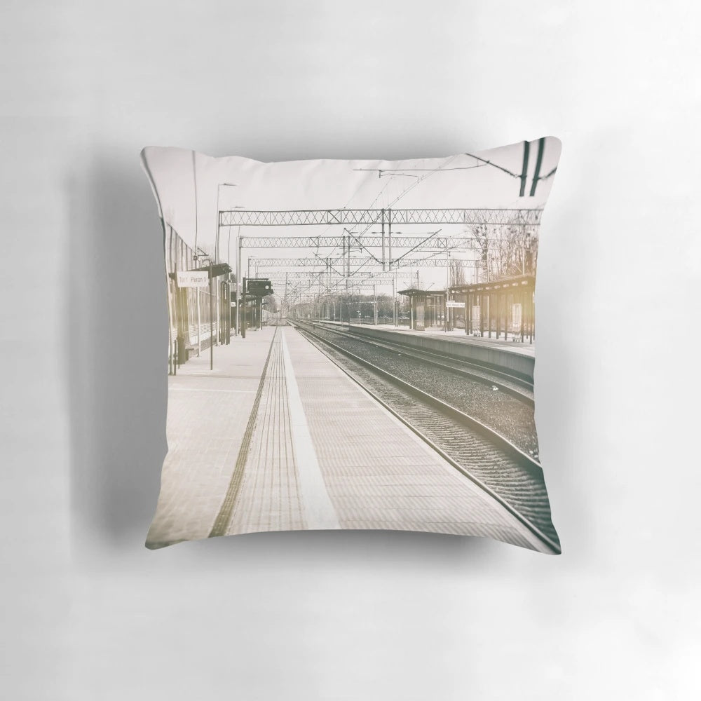 Pillow featuring a striking black and white street photo with a double exposure of a train station and city skyline.