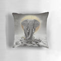 Surreal gray-gold elephant design on a decorative pillow.