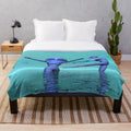 Artistic plush blanket featuring a surreal water ballet design