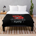 Cozy three-headed puppy plush blanket inspired by the Hades video game