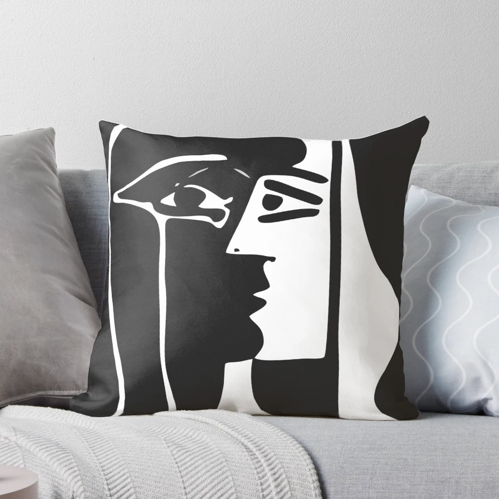 Decorative black and white vector art pillow featuring abstract, minimalist faces design