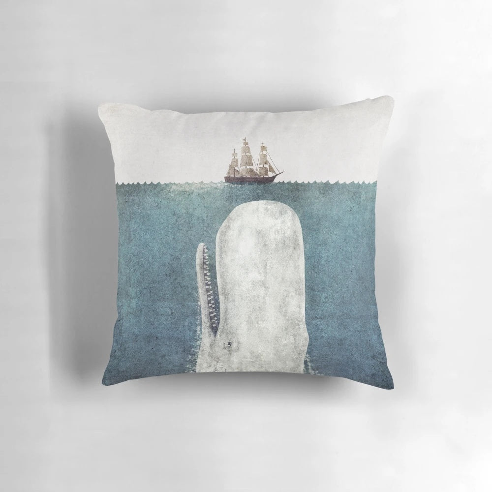 Decorative white whale pillow with a vintage, nautical design