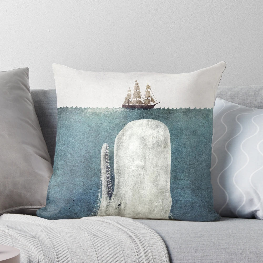 Decorative white whale pillow with a vintage, nautical design