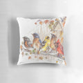 Pillow featuring a stunning wild bird artwork design with a cardinal, blue jay, and finch in a natural setting.