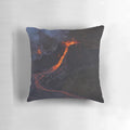 Volcanic eruption inspired pillow featuring fiery red and black lava design