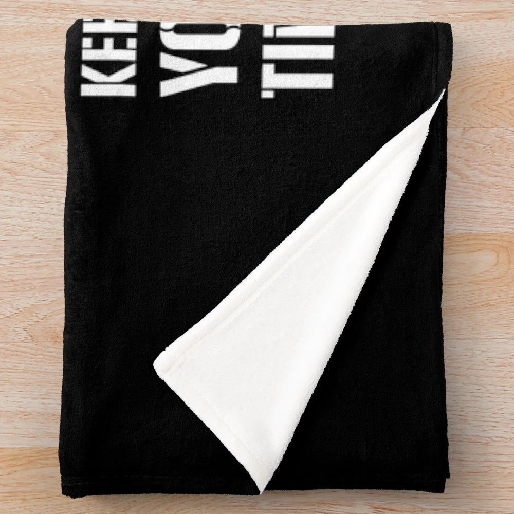 Photography-themed plush blanket with camera and lens design