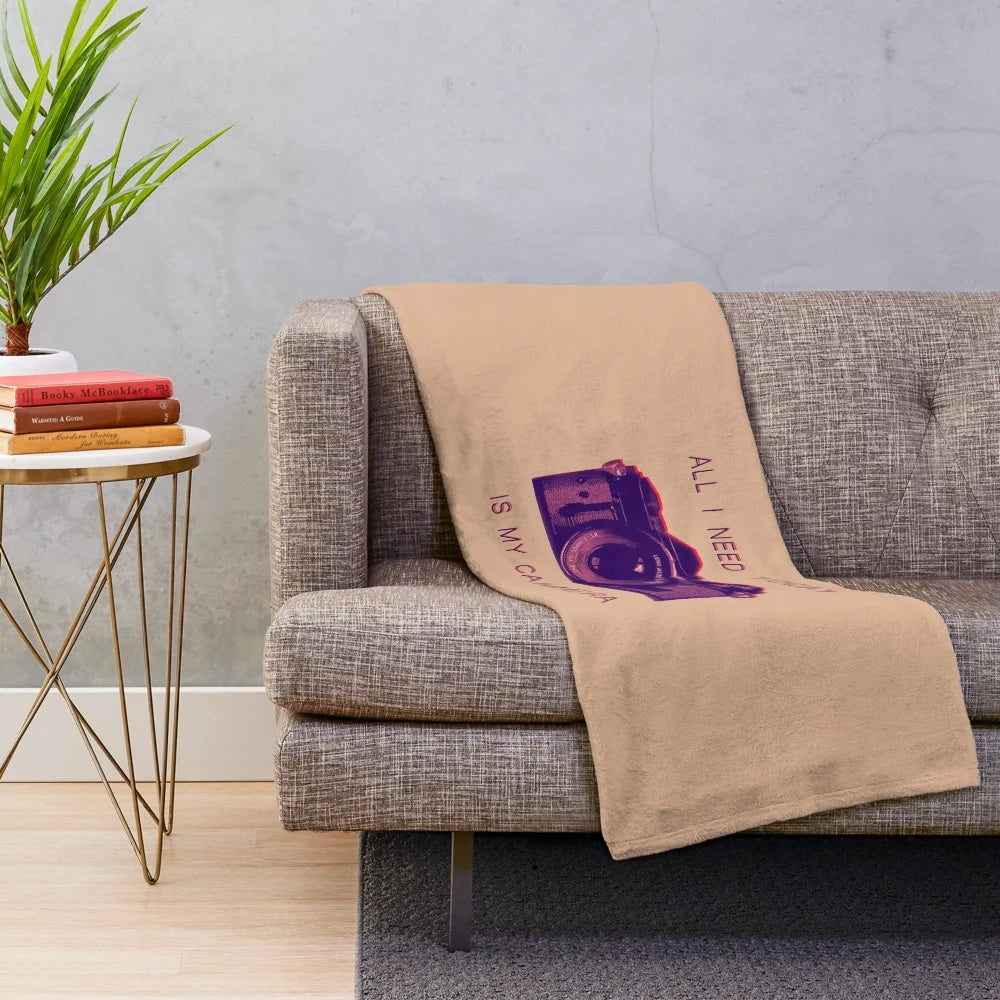 Photography-themed plush blanket with camera and quote
