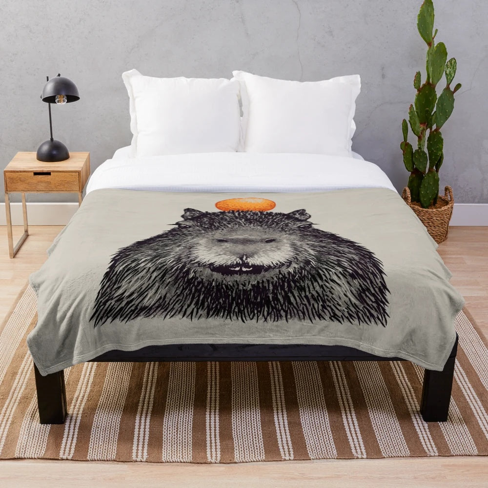 Capybara portrait plush blanket with orange yuzu on head