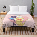 Cardcaptor Sakura inspired plush blanket featuring the three guardians Kero, Spinel, and Momo in a cozy and kawaii design