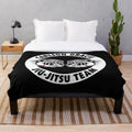 Carlson Gracie-inspired jiu-jitsu plush blanket with Brazilian fighter logo