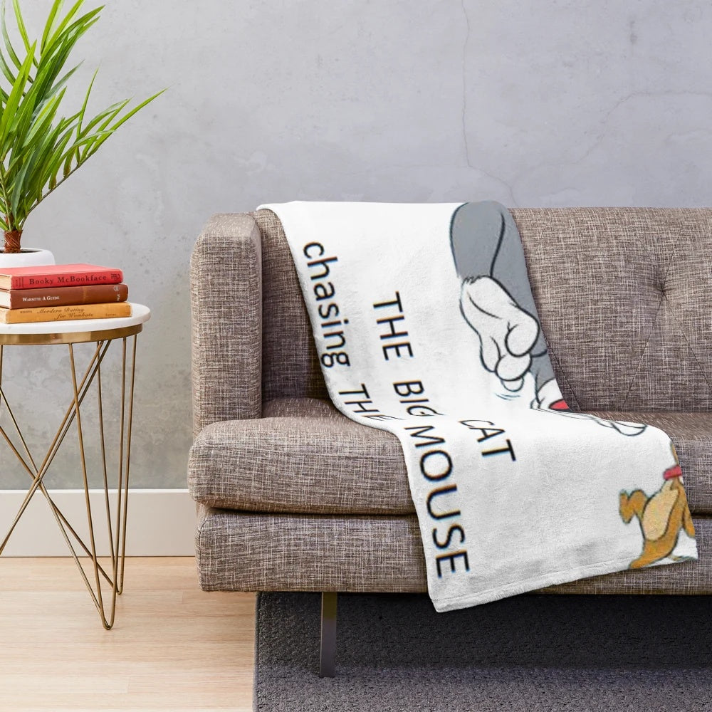 Plush blanket featuring the iconic cartoon characters Tom and Jerry