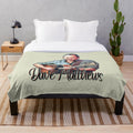 Cartoon illustration of Dave Matthews playing guitar on a plush blanket