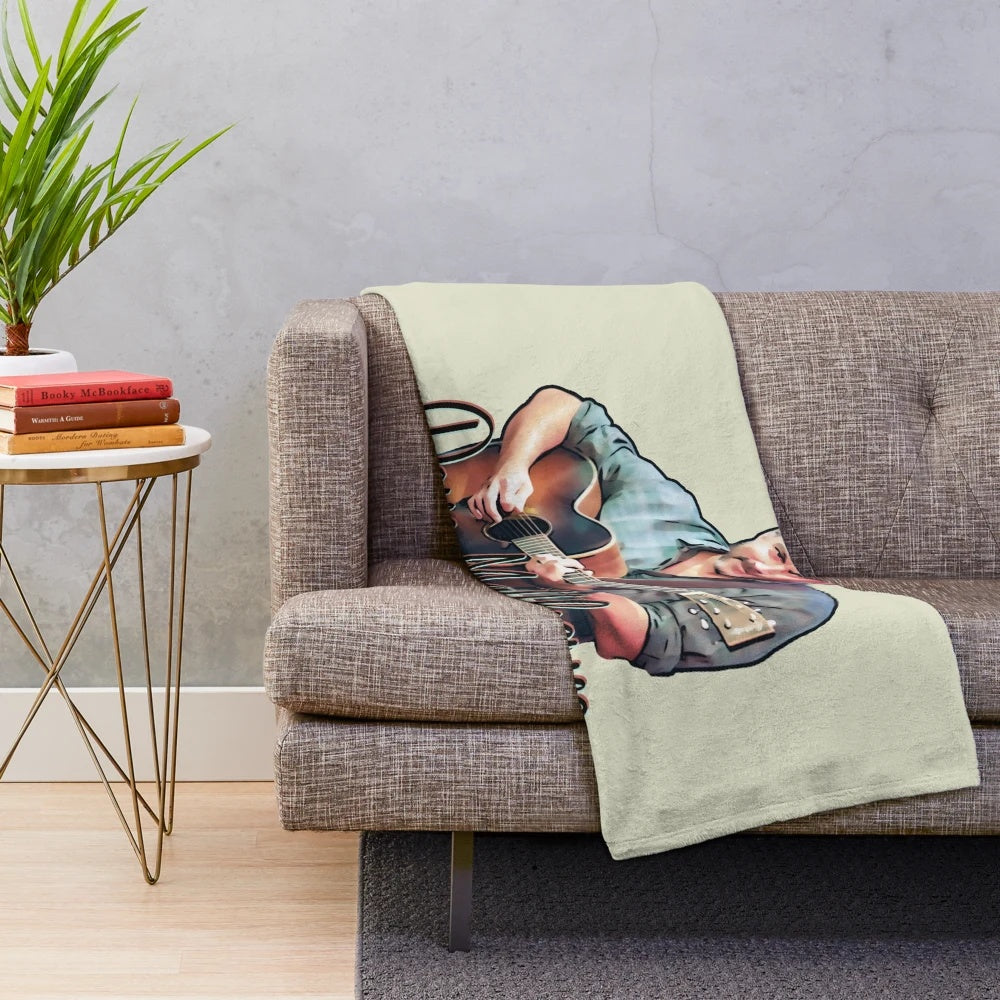 Cartoon illustration of Dave Matthews playing guitar on a plush blanket