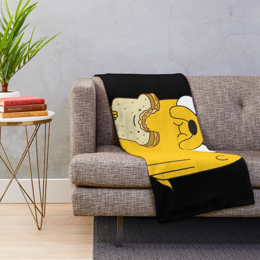 Cartoon inspired plush blanket featuring Jake the Dog from Adventure Time