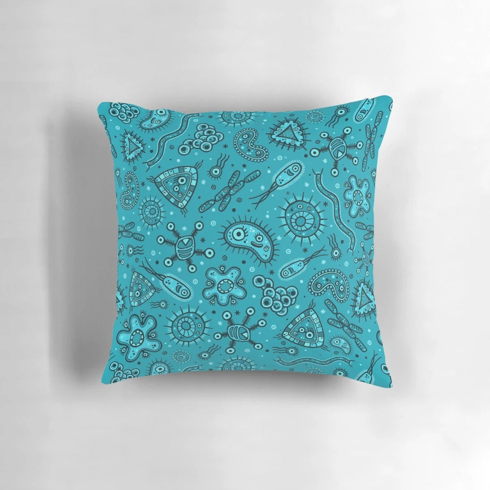 Teal decorative pillow featuring a whimsical cartoon pattern of microbes and germs.