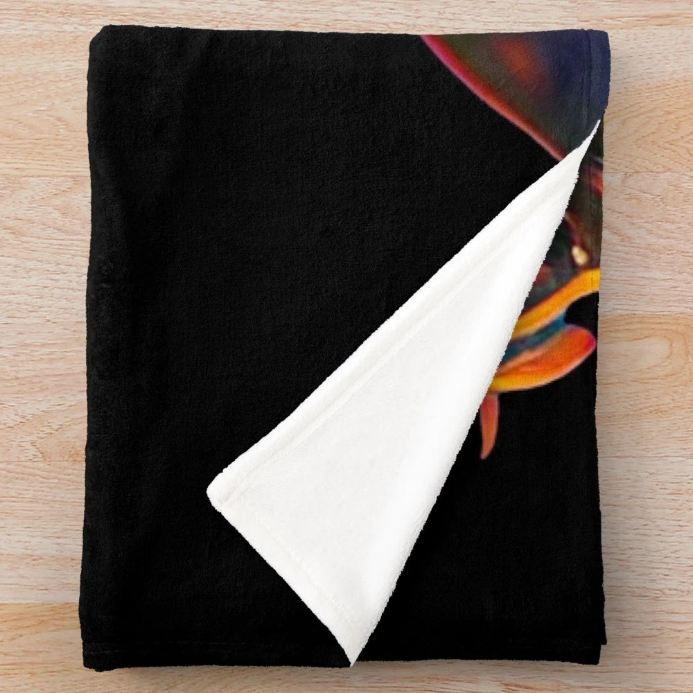 A cozy plush blanket featuring a cartoon portrait of actor Tom Holland