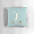 Colorful cartoon scooter pillow with rabbit/bunny design, perfect for kids' bedrooms and Easter decorating.
