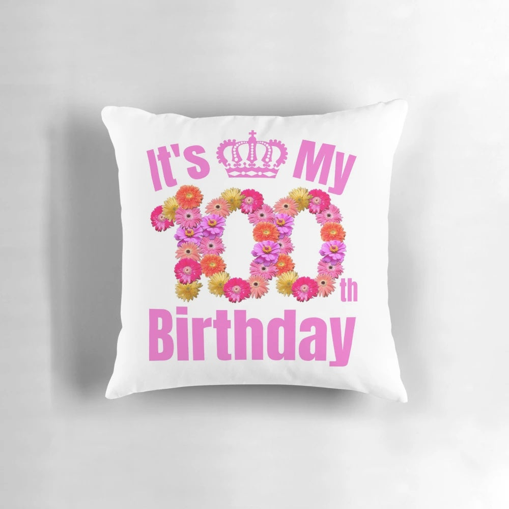 A cozy sweatshirt-style pillow celebrating a 100th birthday with a floral design