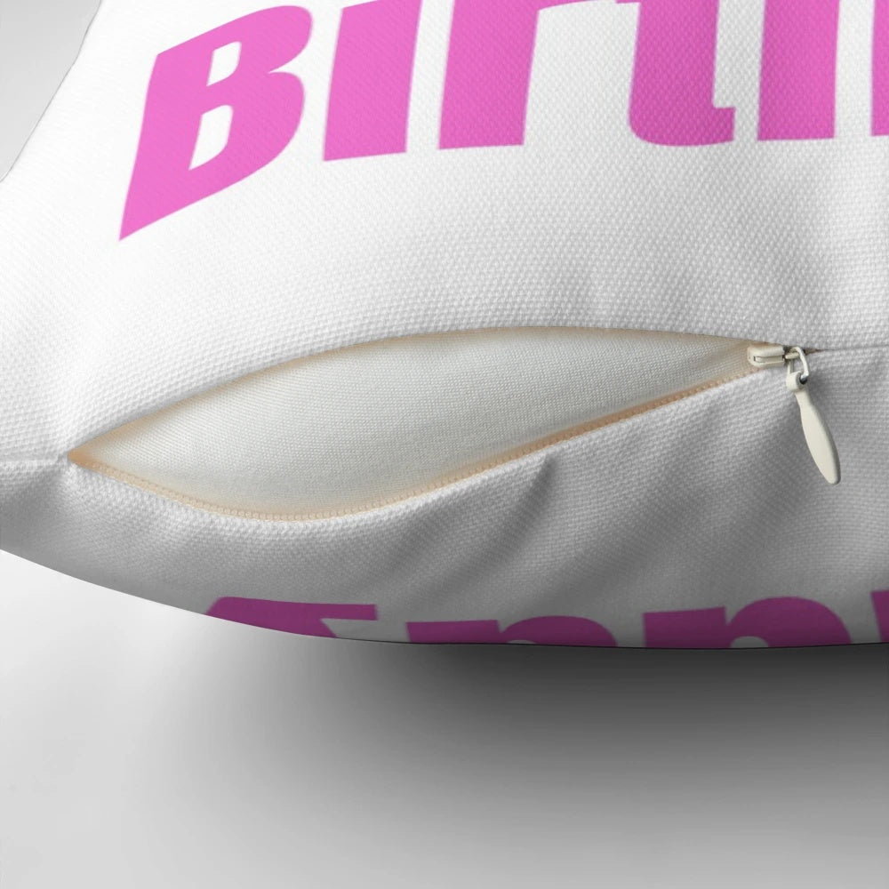 A cozy sweatshirt-style pillow celebrating a 100th birthday with a floral design
