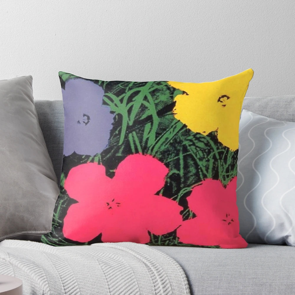 Vibrant Andy Warhol-inspired pillow featuring his iconic pop art design