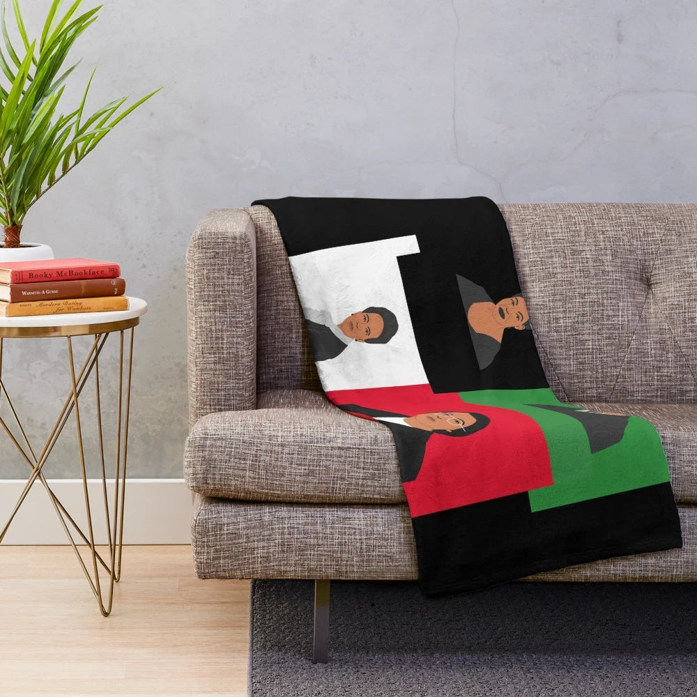 Plush blanket featuring black female icons and cultural elements