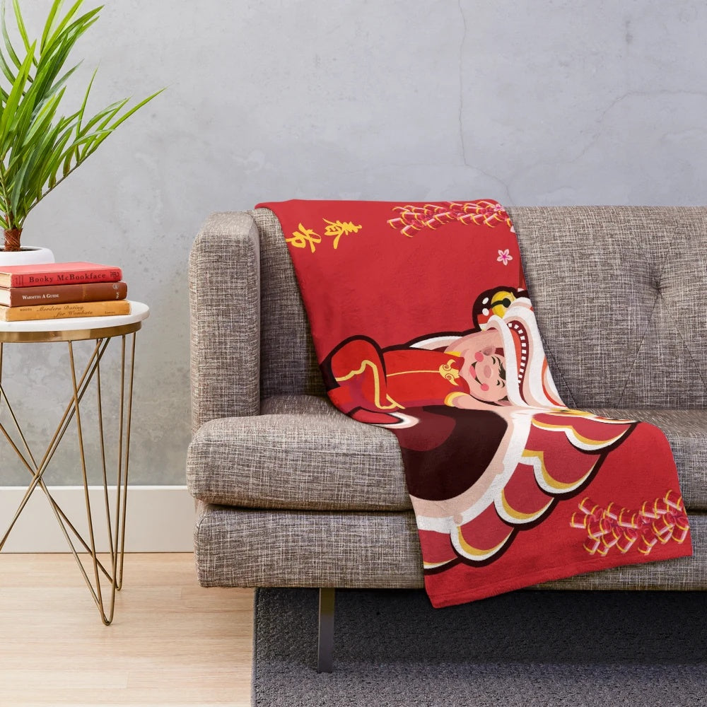 Red plush blanket with Chinese lion dance character design