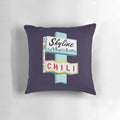 Pillow featuring the Cincinnati skyline and Skyline Chili sign on Ludlow Ave