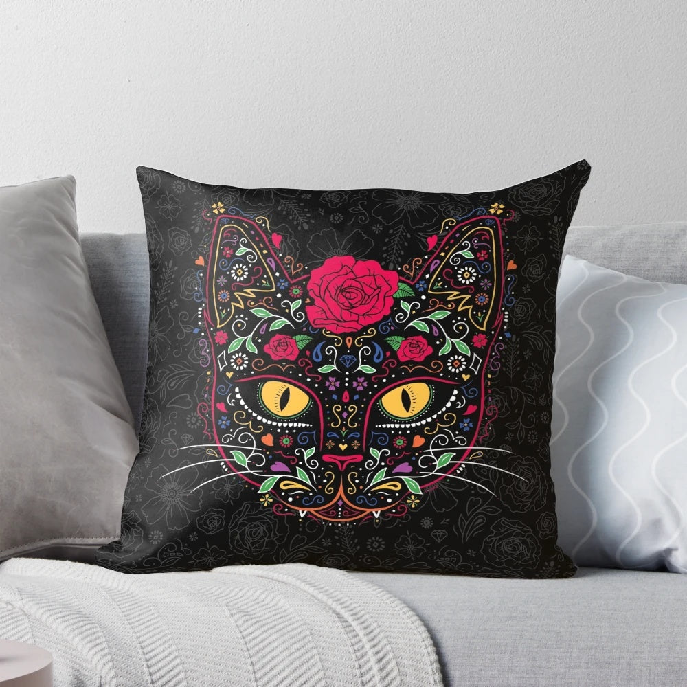 A vibrant day of the dead kitty cat sugar skull pillow featuring intricate floral patterns and a black cat design