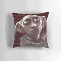 A vibrant, illustrated pillow featuring Dobby the house elf from the Harry Potter series.