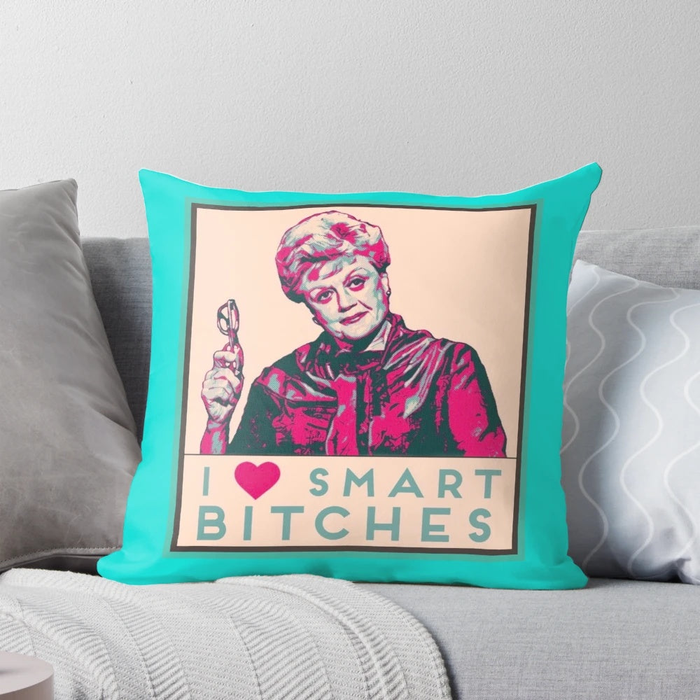 A white pillow with the text "I heart smart b****es like JB Fletcher" printed on it.