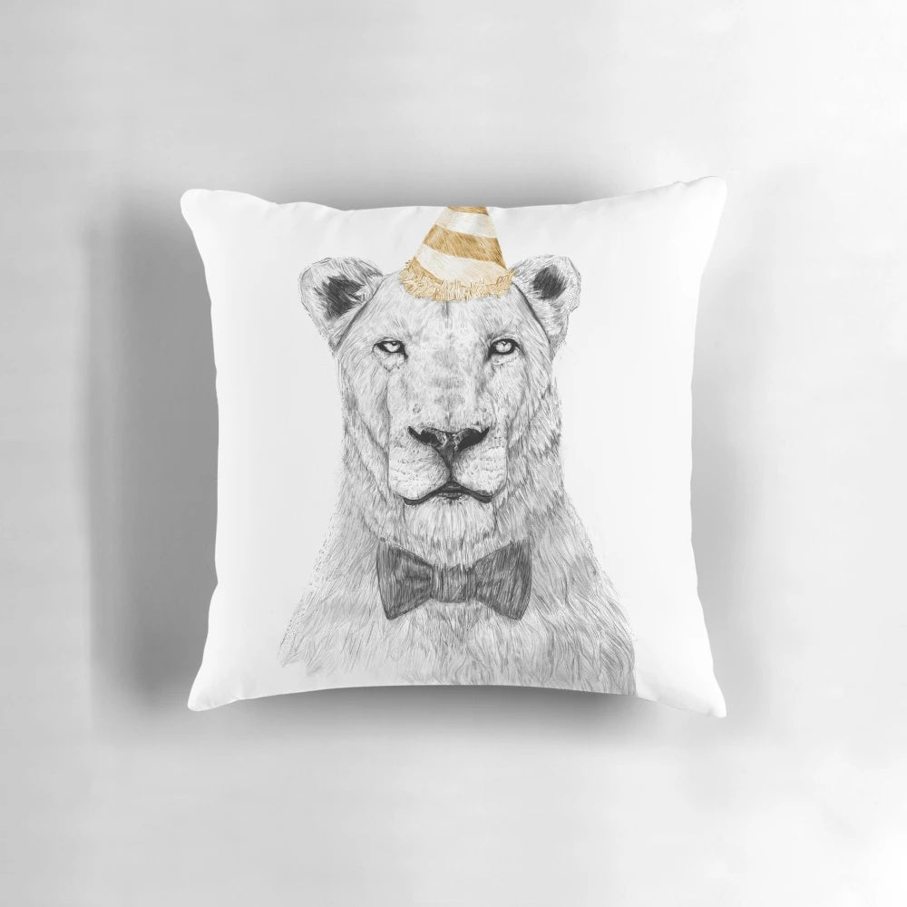 A colorful, illustrated pillow featuring a playful lion or lioness wearing a party hat, perfect for adding a touch of fun and whimsy to any space.