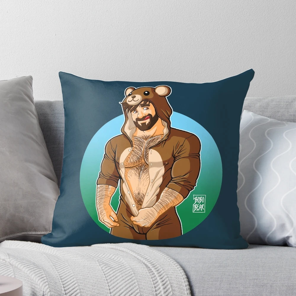 A vibrant, inclusive pillow featuring a bear character surrounded by colorful pride-themed elements.