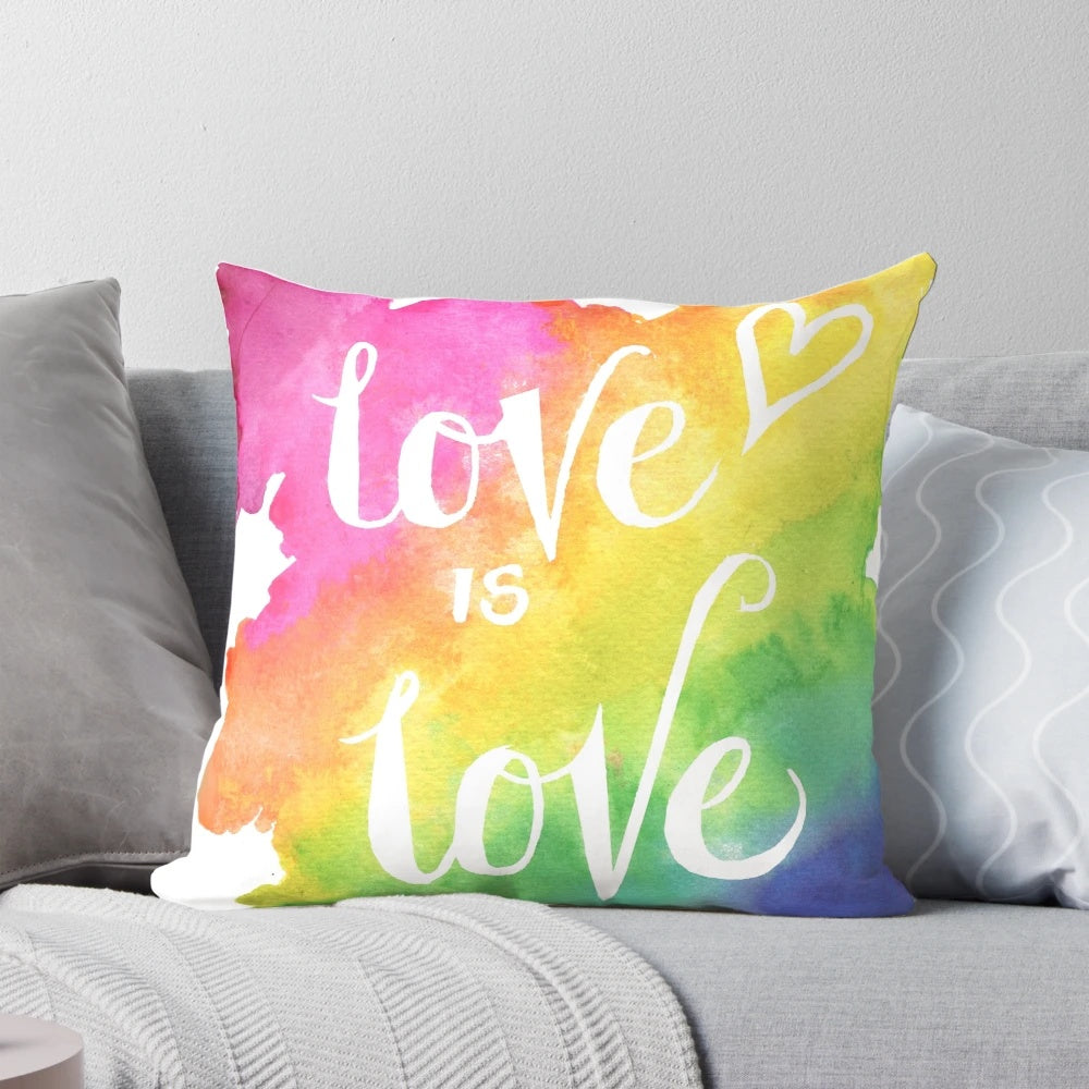 Colorful watercolor "Love is Love" pillow with rainbow design