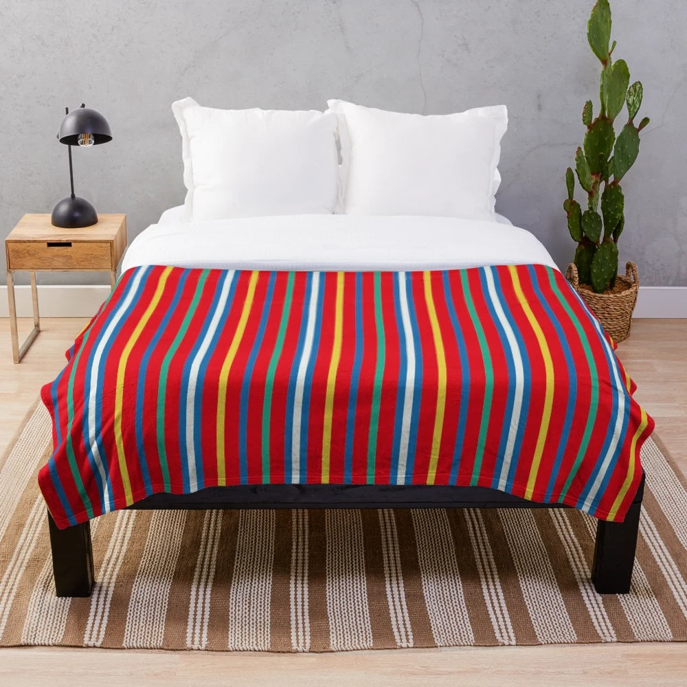 Plush blanket featuring the vibrant colors and patterns of Madeira Island's culture