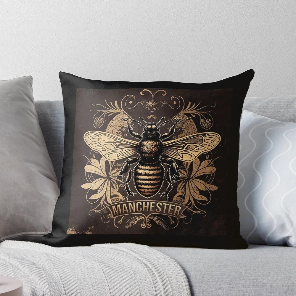 A decorative pillow featuring the iconic Manchester worker bee design, a symbol of Manchester pride.