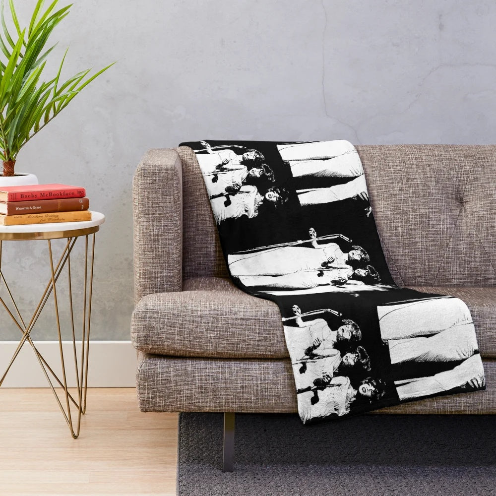 Plush blanket featuring images of iconic Motown singers like Diana Ross and The Supremes