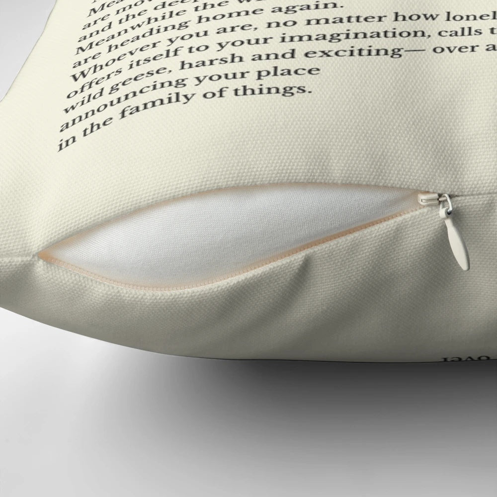 A decorative pillow featuring the "Wild Geese" poem by Mary Oliver, with a design of geese in flight.