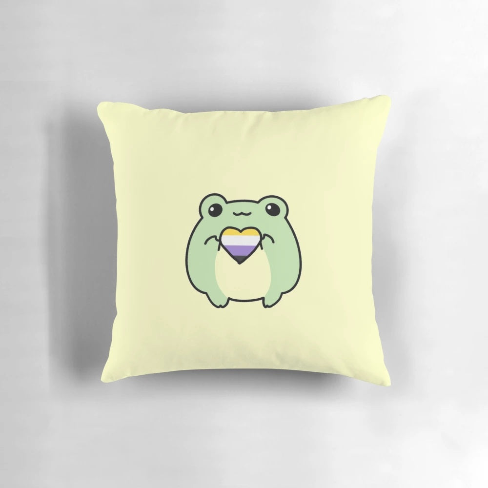 A colorful non-binary pride flag-inspired pillow featuring a whimsical frog design